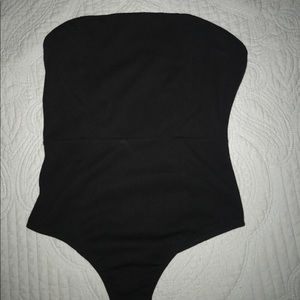 Strapless, tight, body suit